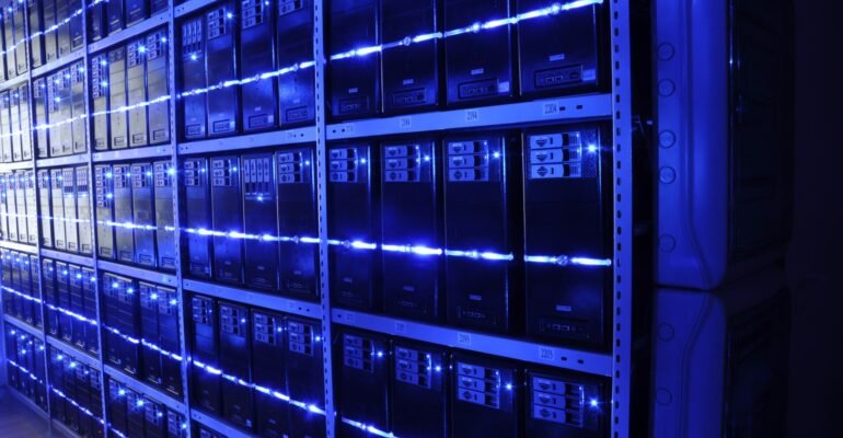 Rows of servers in a data center, representing the health information systems behind telemedicine and eHealth.