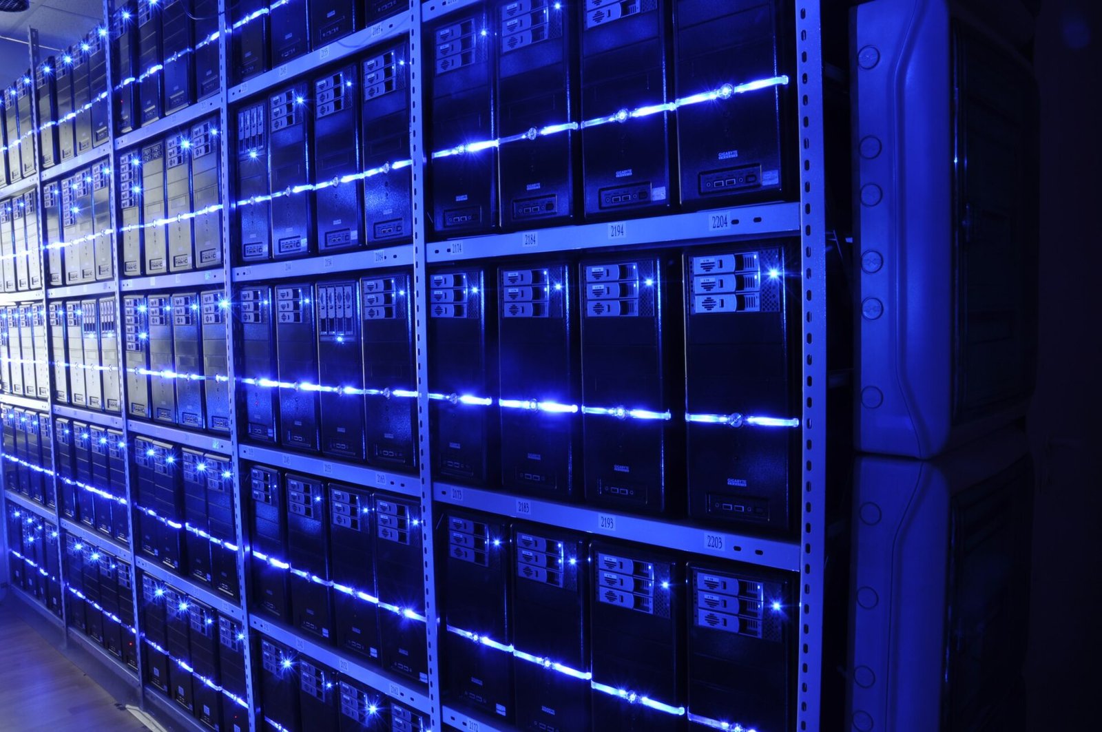Rows of servers in a data center, representing the health information systems behind telemedicine and eHealth.