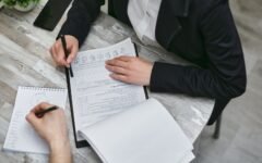 Professionals reviewing quality audit documents