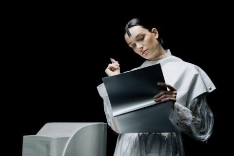 Professional reviewing data with advanced technology