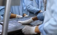 Workers in a medical device and pharmaceutical facility
