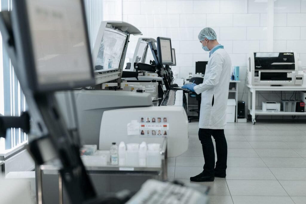 Engineer testing a medical device in a laboratory